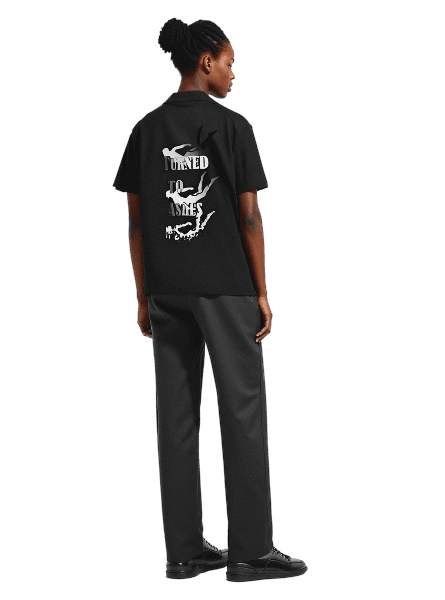 Model wearing Grey black t-shirt and trousers